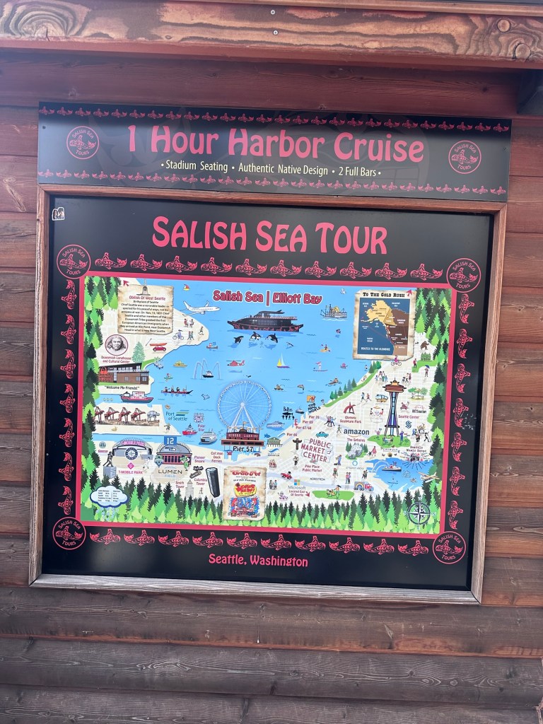 Salish Sea Tours harbor cruise sign in Seattle offering Elliott Bay sightseeing tour