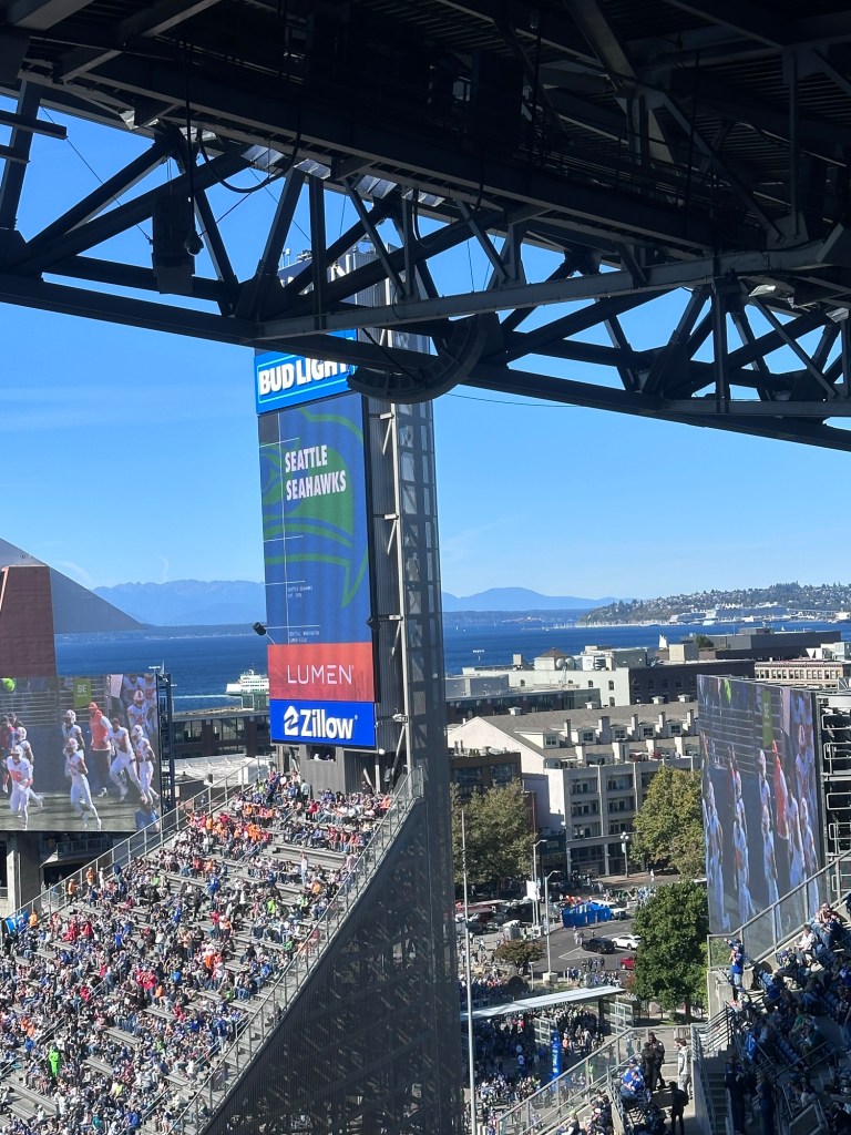 Inside Lumen Field stadium during Seahawks game with fans and field view